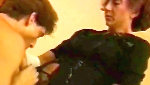 Older brunette and a strapon pegging and cum on a strapon