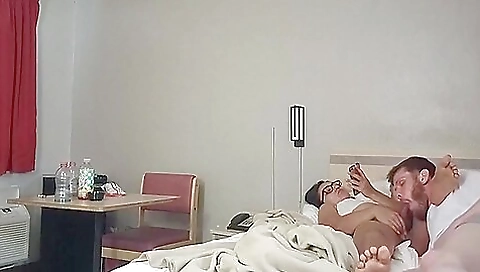 Brunette is giving a deepthroat to the peeping tony