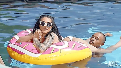 Blonde girl with bold tattoo gets exposed on the beach